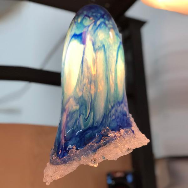 <p>Ocean Wave Pendant with Foam Fringe<br>13 in tall, 8 in wide<br> Retail Price: $1,729.00</p>