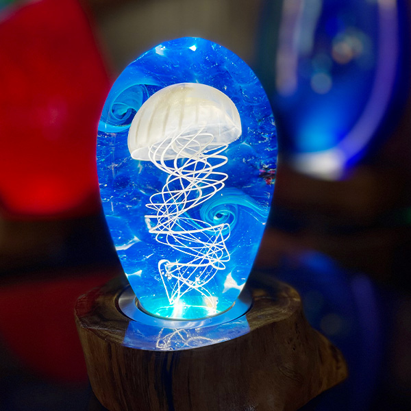 <p>Small Jellyfish<br>Dim: 5 1/4” tall x 3 3/4” wide<br> Retail Price: $849.00<br>These are one-of-a-kind pieces. Pictured is the actual art you’ll receive</p>