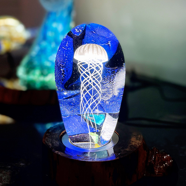 <p>Small Dichro Jellyfish<br>Dim: 5.5” tall x 3” wide x 2.25” depth<br> Retail Price: $1,250.00<br>These are one-of-a-kind pieces. Pictured is the actual art you’ll receive</p>